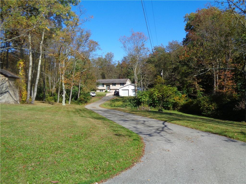 204 Gilchrist Road Uniontown, PA 15401 - Photo 9 of 22 a view of a park with large trees