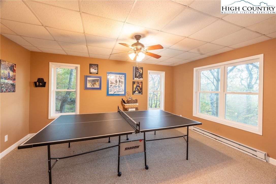 309 Pinnacle Ridge Road Beech Mountain, NC 28604 - Photo 26 of 45 a view of a workspace with furniture and a window