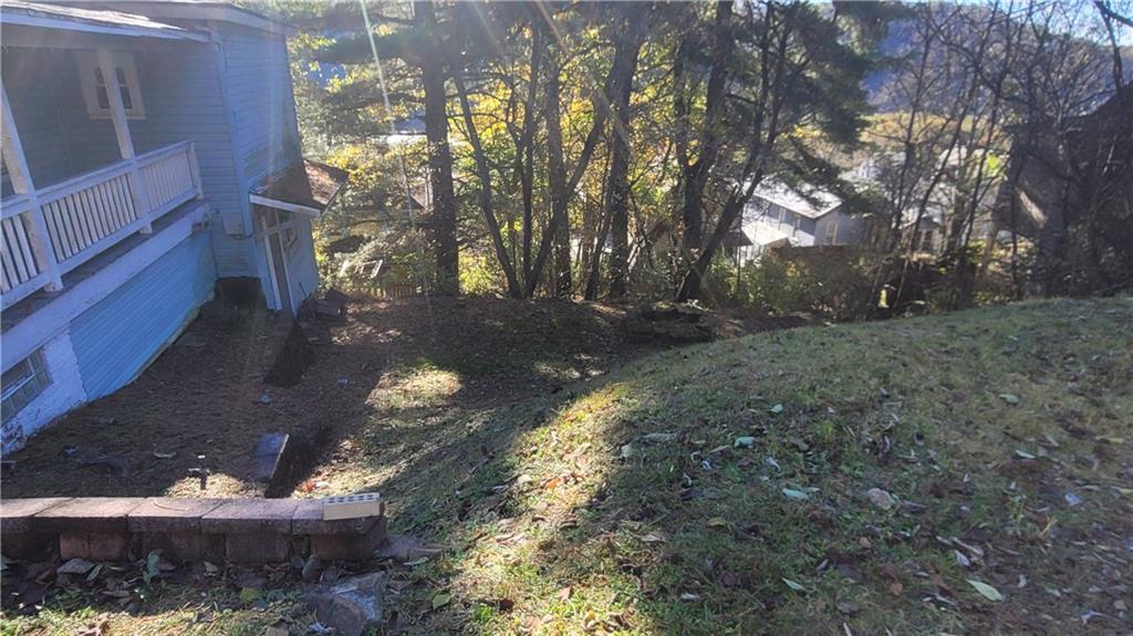 178 Washington Street Freeport, PA 16229 - Photo 15 of 17 a view of a yard with large trees