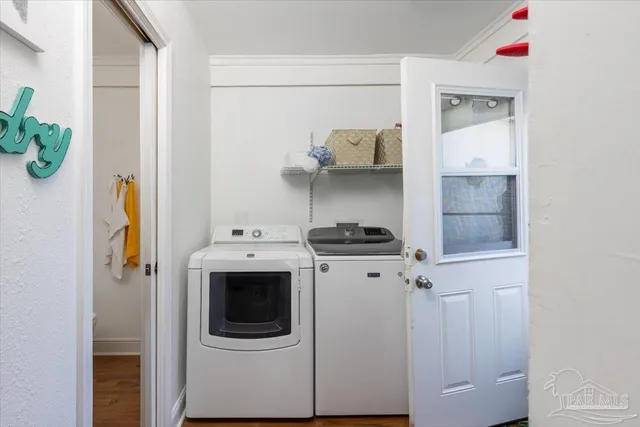 a utility room with dryer and washer