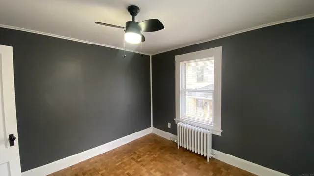 a view of an empty room and window