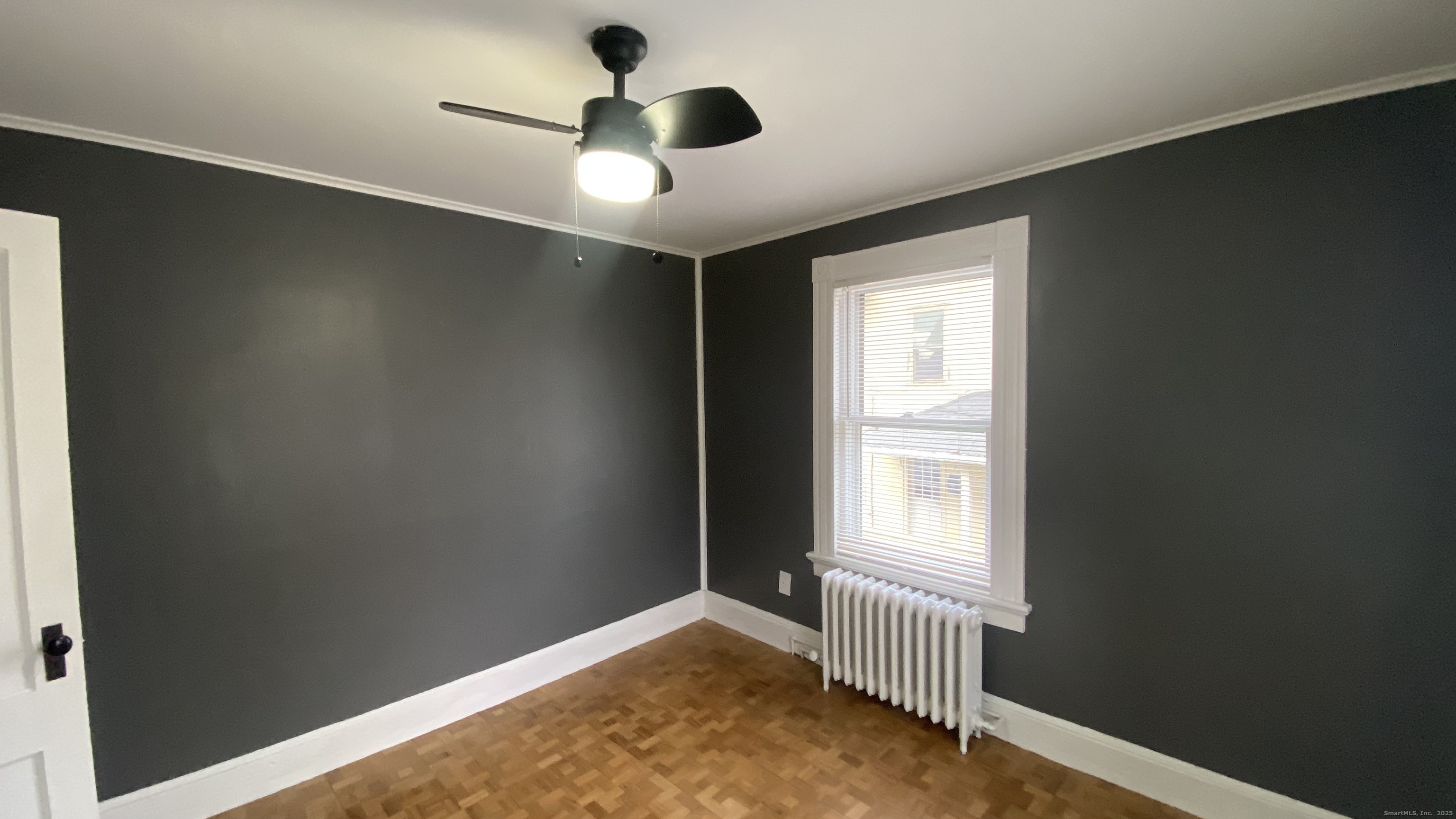 26 Pine Street, Unit 2 Torrington, CT 06790 - Photo 18 of 36 a view of an empty room and window
