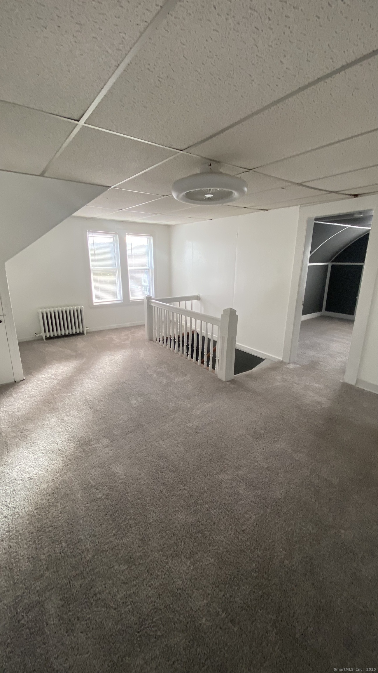 26 Pine Street, Unit 2 Torrington, CT 06790 - Photo 29 of 36 a view of a livingroom with a couch