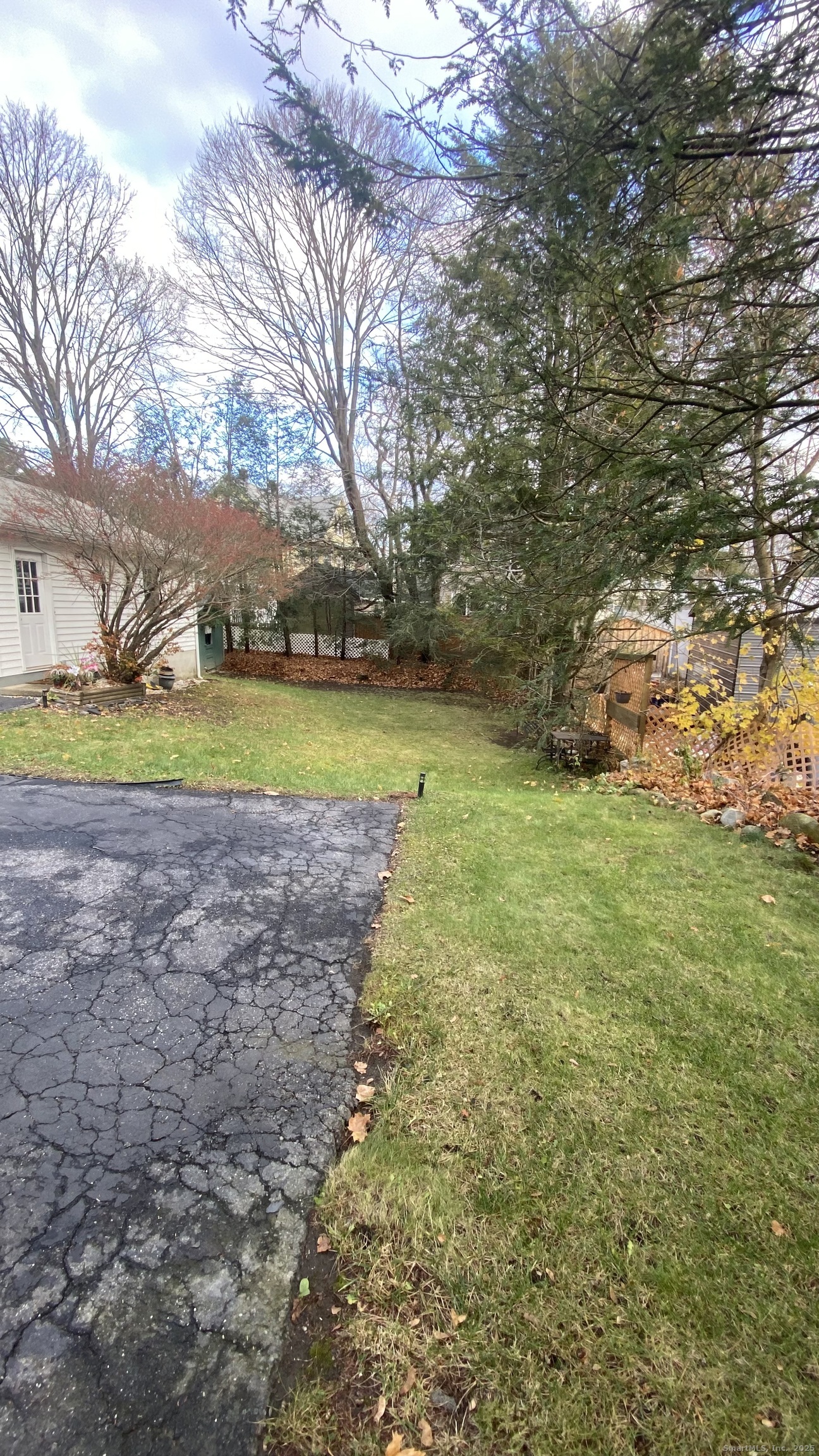26 Pine Street, Unit 2 Torrington, CT 06790 - Photo 34 of 36 a view of a field with large trees