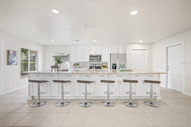 a kitchen with cabinets and sink