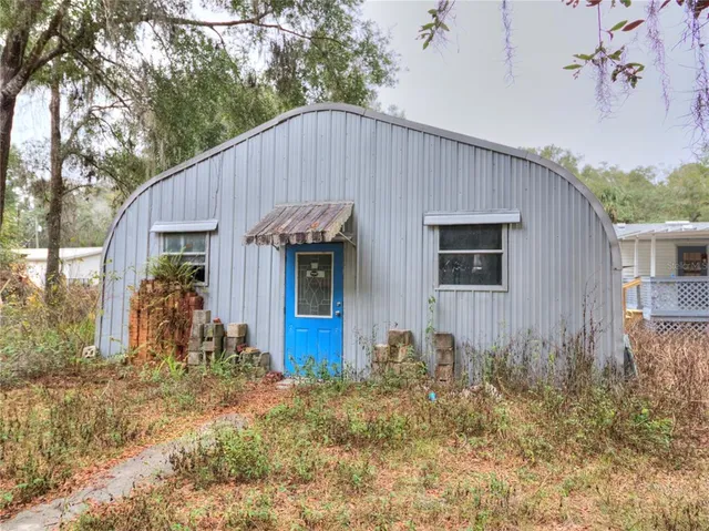 a house view with a outdoor space