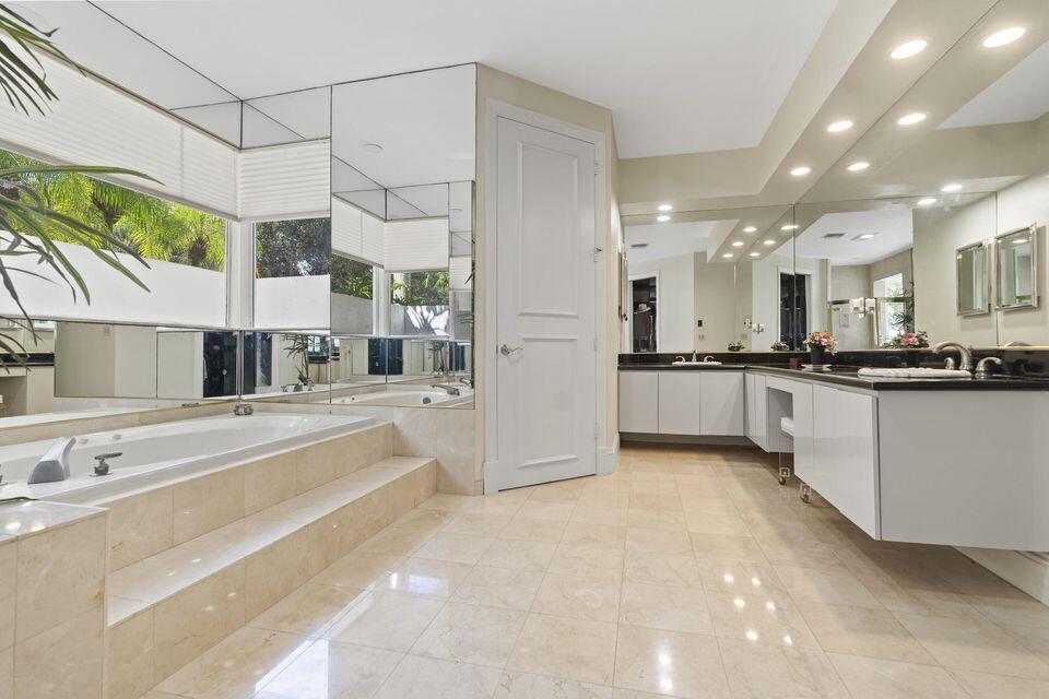 3271 Harrington Drive Boca Raton, FL 33496 - Photo 15 of 43 a large white kitchen with a large window