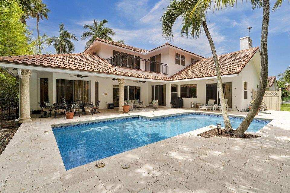 3271 Harrington Drive Boca Raton, FL 33496 - Photo 2 of 43 a view of a white house with a yard patio and swimming pool