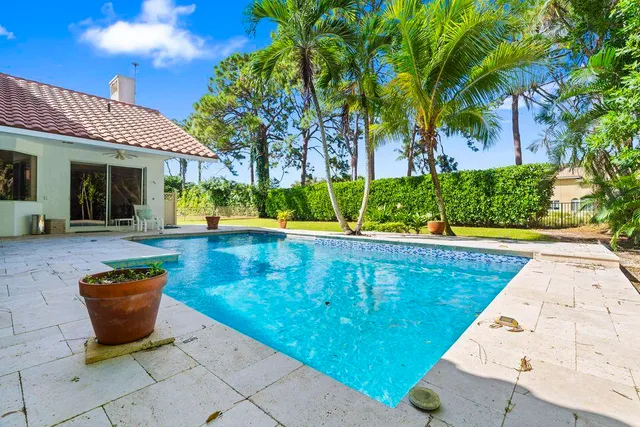 a view of a house with a swimming pool