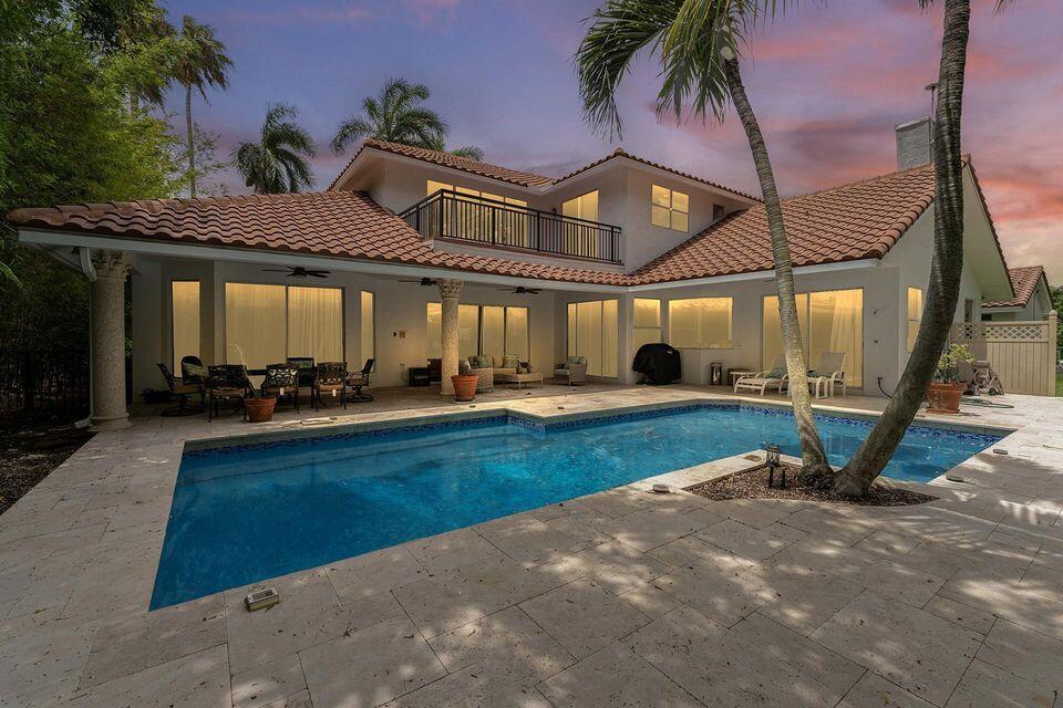 3271 Harrington Drive Boca Raton, FL 33496 - Photo 24 of 43 a view of a house with a swimming pool