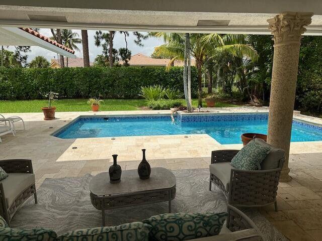 3271 Harrington Drive Boca Raton, FL 33496 - Photo 25 of 43 a view of swimming pool with seating space