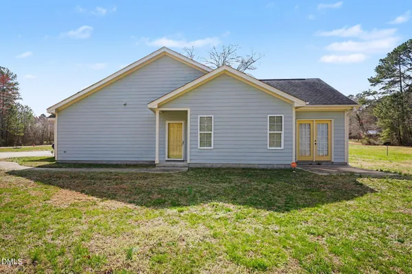 a view of a backyard with a garden