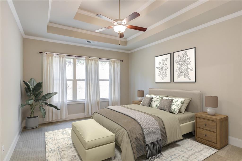 5630 Overlook Club Circle Suwanee, GA 30024 - Photo 13 of 32 a bedroom with a balcony a bed and a chandelier