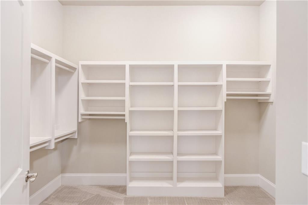 5630 Overlook Club Circle Suwanee, GA 30024 - Photo 18 of 32 a view of an empty walk in closet