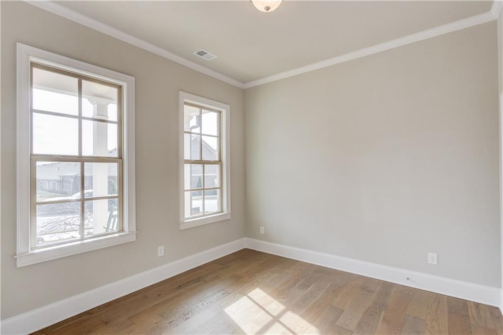 5630 Overlook Club Circle Suwanee, GA 30024 - Photo 19 of 32 an empty room with windows