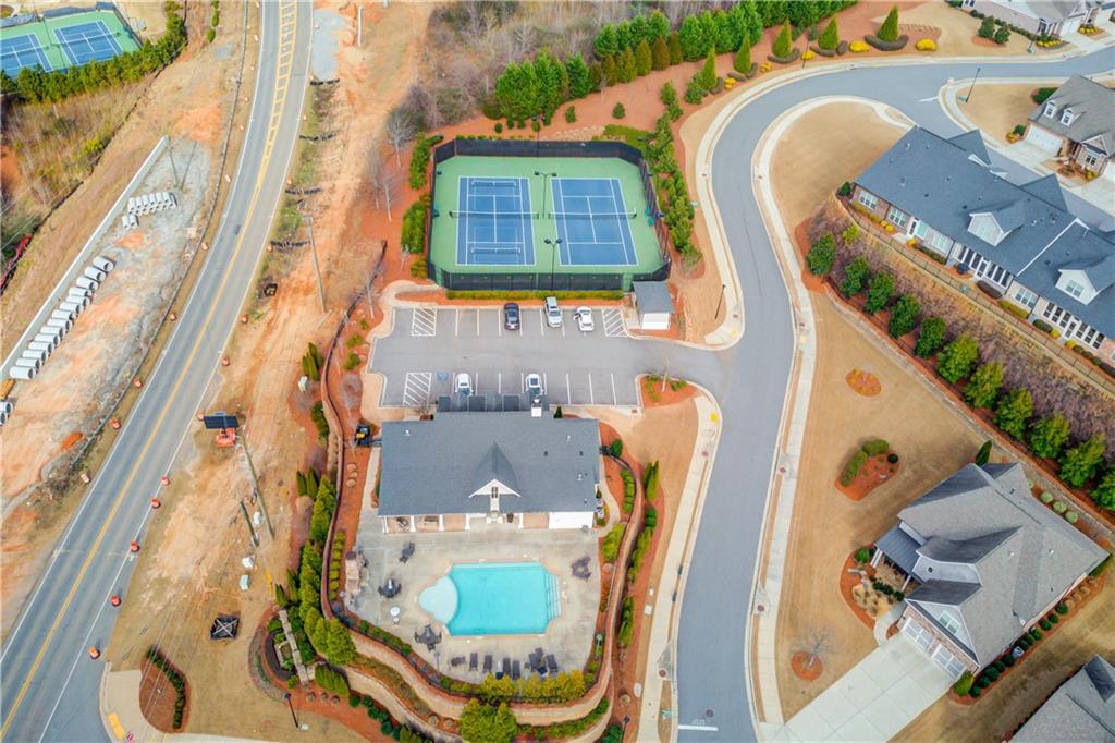 5630 Overlook Club Circle Suwanee, GA 30024 - Photo 27 of 32 an aerial view of a house with a swimming pool and outdoor seating