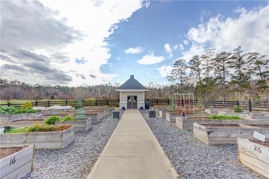 5630 Overlook Club Circle Suwanee, GA 30024 - Photo 30 of 32 a view of a swimming pool and lounge chairs