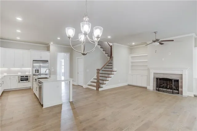a view of a kitchen with furniture and a fireplace
