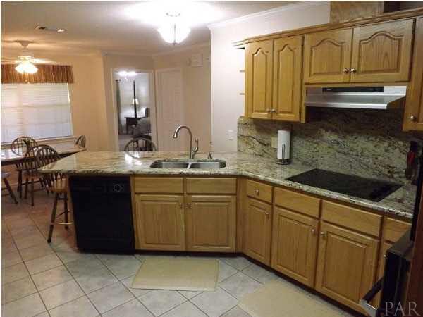 848 Williams Ditch Road Cantonment, FL 32533 - Photo 5 of 25 Kitchen with breakfast bar and plenty of cabinets