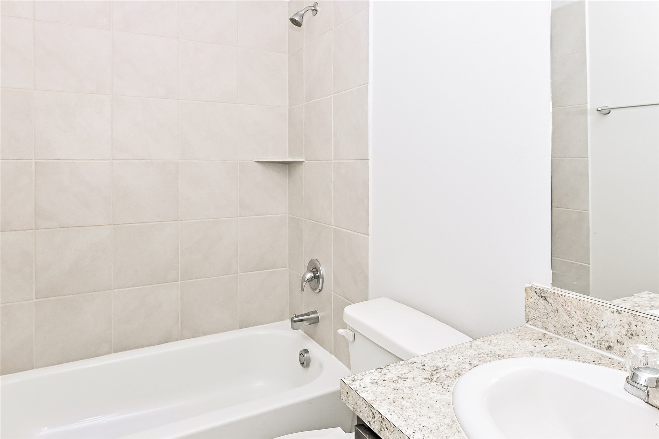 4911 Sweet Chestnut Lane Spring, TX 77373 - Photo 15 of 18 a bathroom with a sink and a bathtub