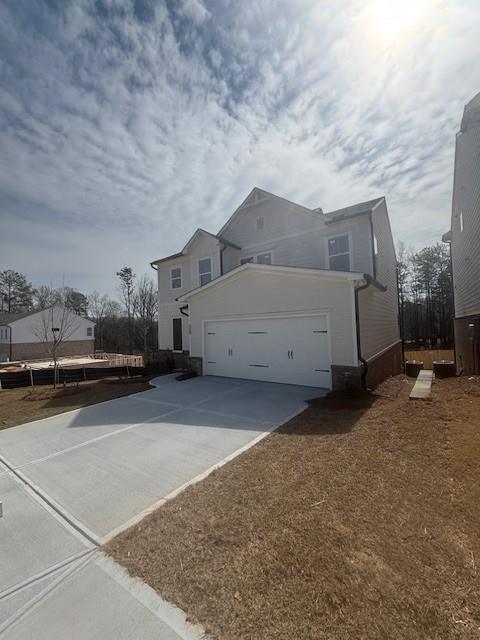 100 Bridgeview (lot 1) Way Canton, GA 30114 - Photo 2 of 31 a view of a car garage