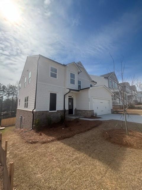 100 Bridgeview (lot 1) Way Canton, GA 30114 - Photo 3 of 31 a front view of a house with a yard
