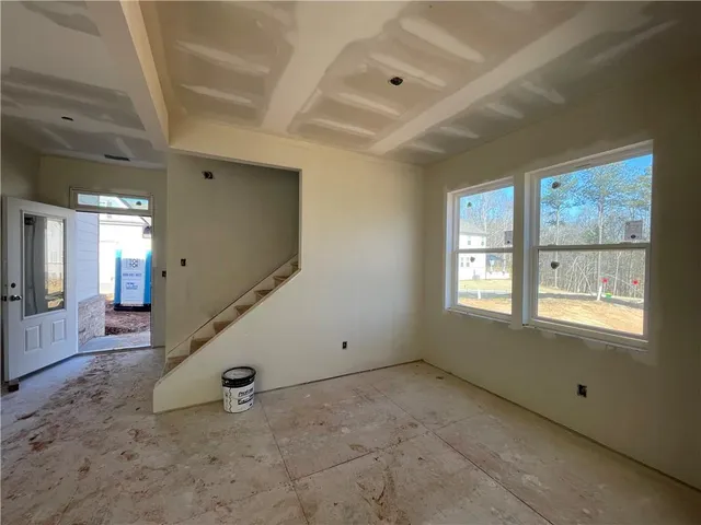 an empty room with windows