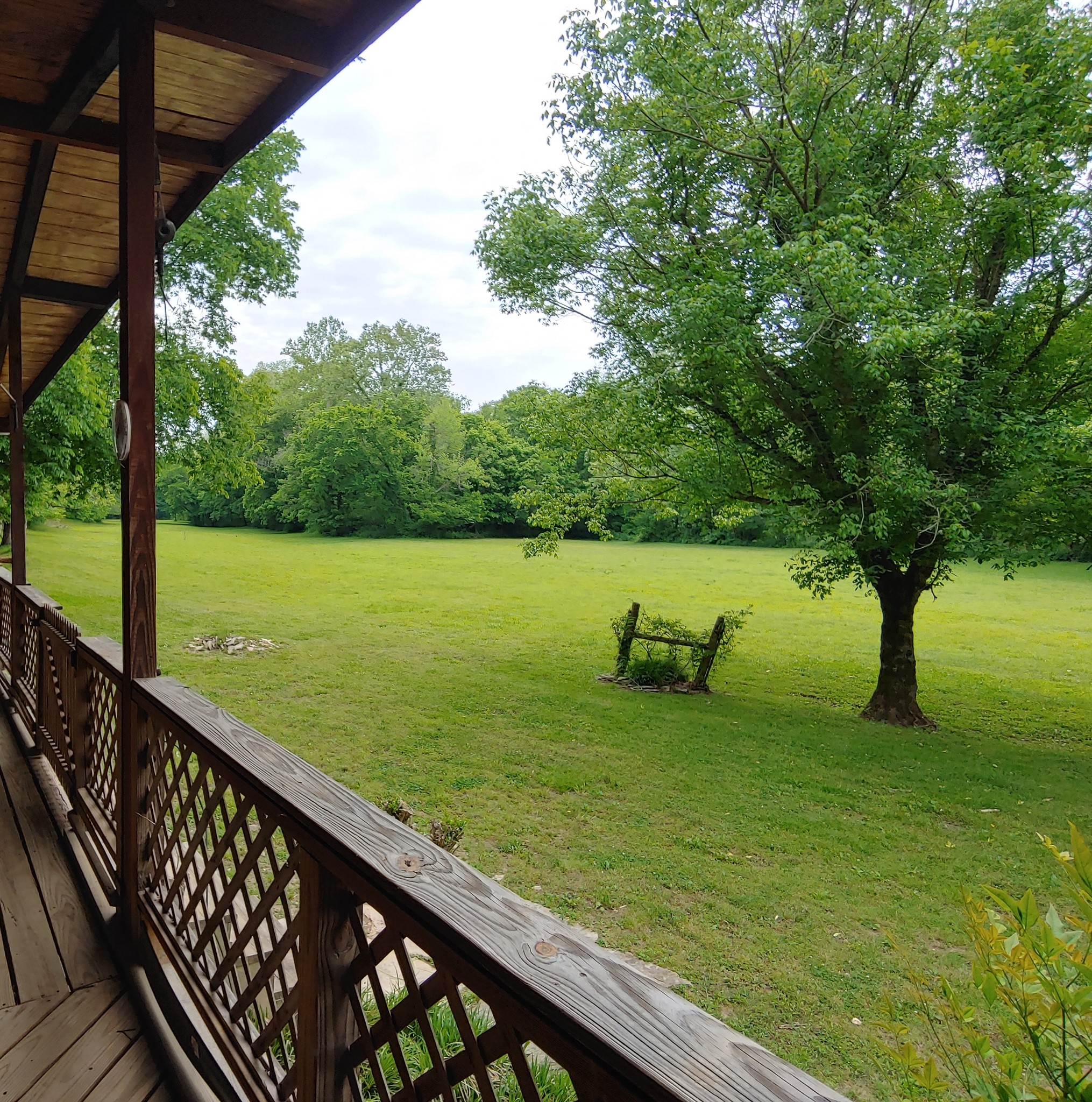 176 Wills Road Hurricane Mills, TN 37078 - Photo 3 of 32 a view of a yard with an outdoor seating
