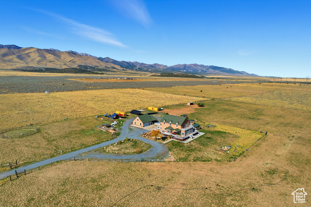 4768 East Hickman Canyon Road Stockton, UT 84071 - Photo 78 of 85 Aerial view of home featuring mountains, north west.