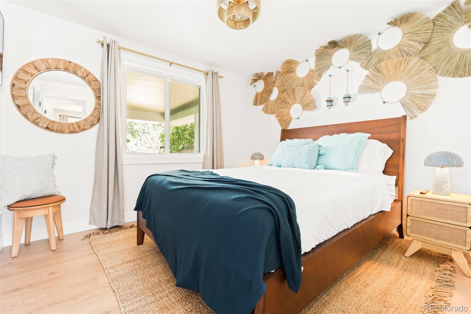 6115 Chase Street Arvada, CO 80003 - Photo 36 of 45 a bedroom with a bed and a window