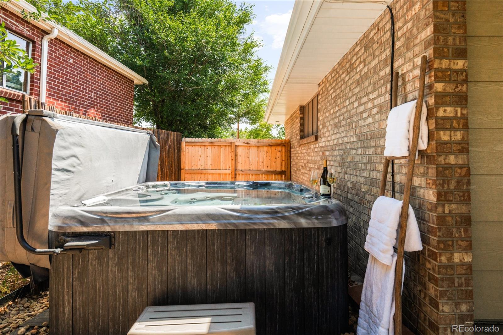 6115 Chase Street Arvada, CO 80003 - Photo 41 of 45 a view of entryway with backyard