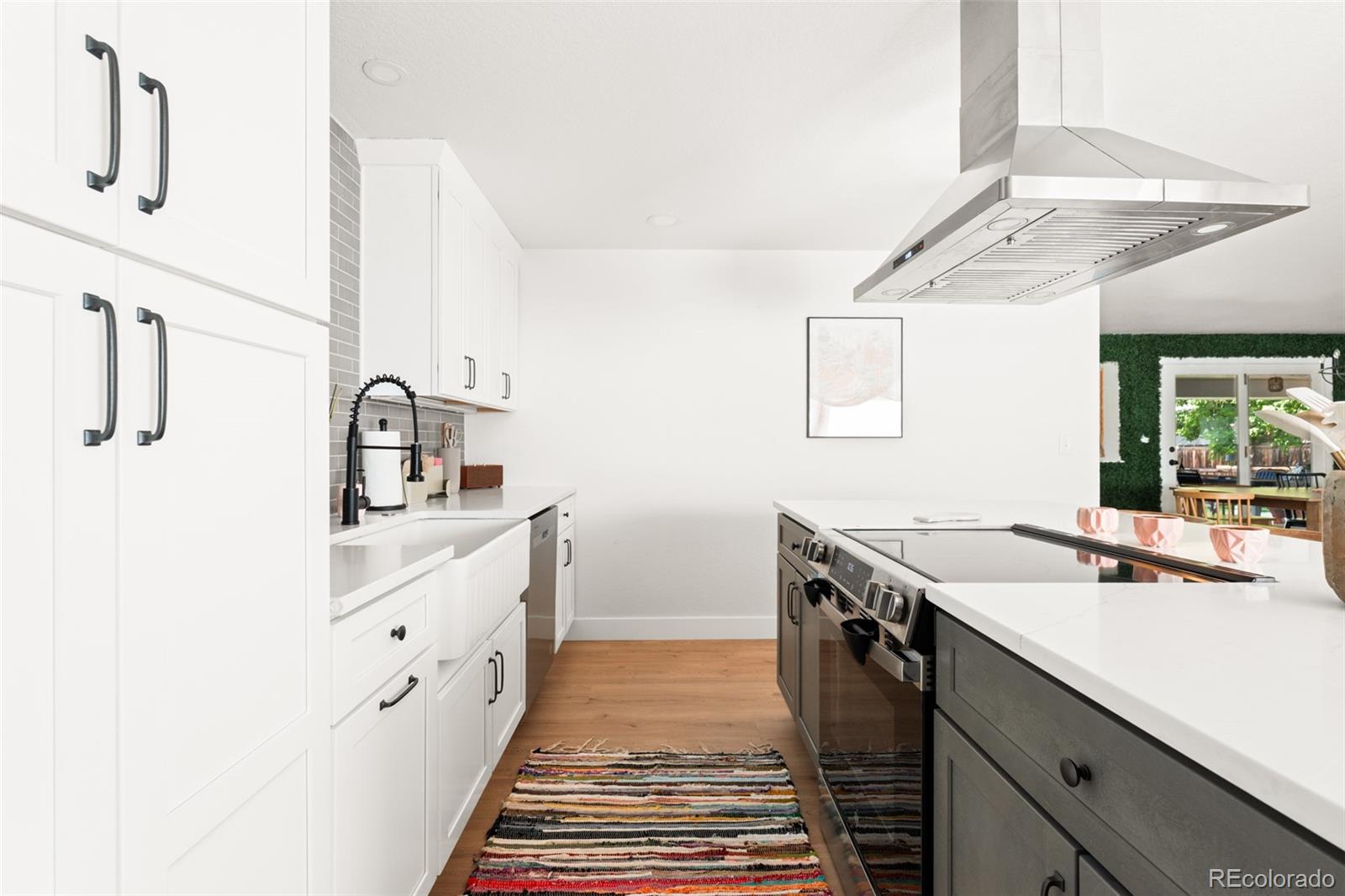 6115 Chase Street Arvada, CO 80003 - Photo 7 of 45 a room with sink and mirror