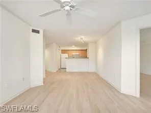 a view of a livingroom with a ceiling fan