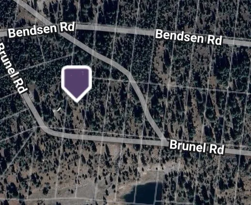 a picture of a bathroom with wooden floor