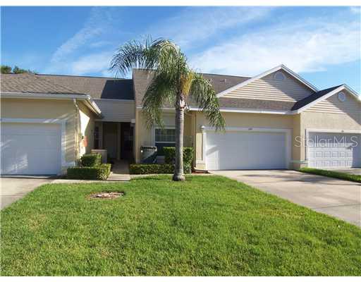 1050 Starkey Road, Unit 204 Largo, FL 33771 - Photo 1 of 1 Exterior Front - Villa is just behind the Palm Tree. Notice the long 4 car Driveway. NICE NICE VILLA