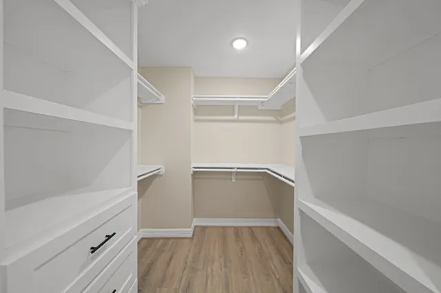 a view of an empty walk in closet