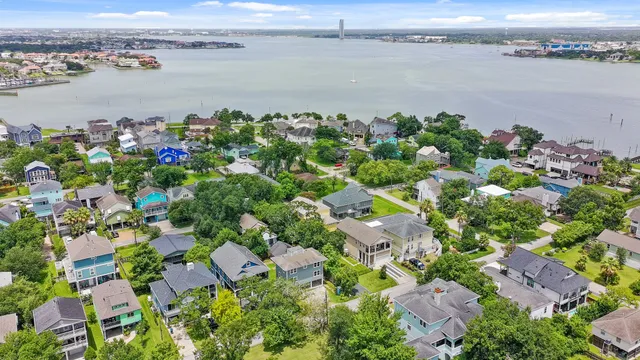 an aerial view of a house with a garden