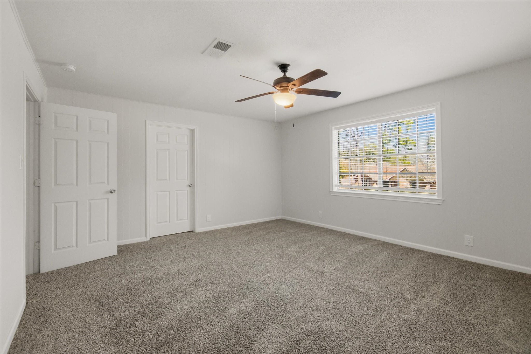 113 Rose Trail Lake Jackson, TX 77566 - Photo 32 of 45 a view of an empty room with a window