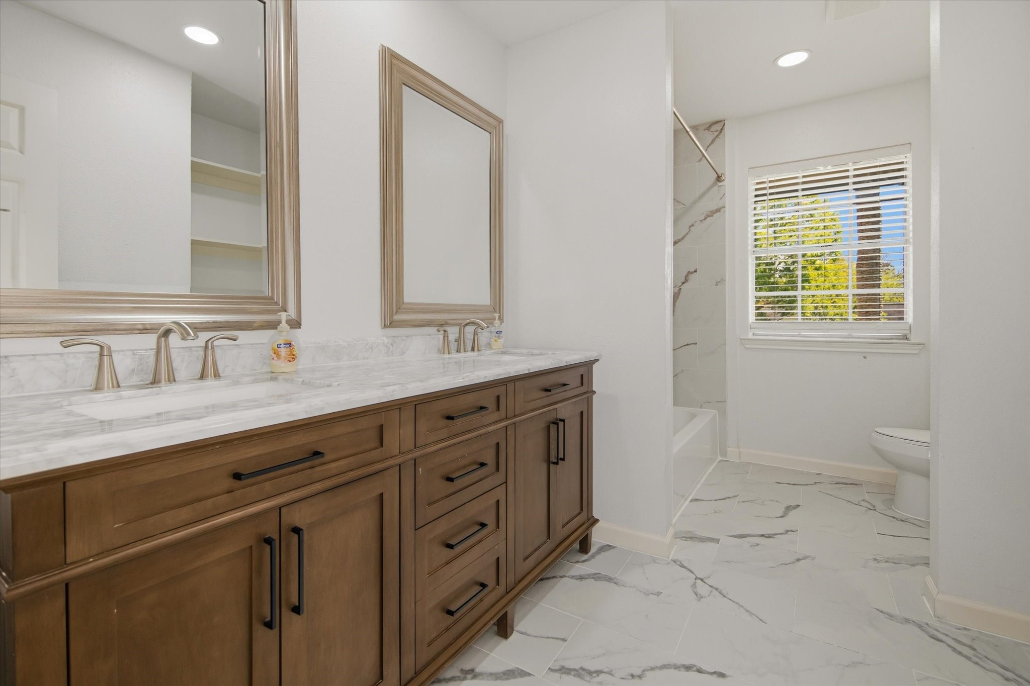 113 Rose Trail Lake Jackson, TX 77566 - Photo 35 of 45 a spacious bathroom with 2 sink double vanity and a shower