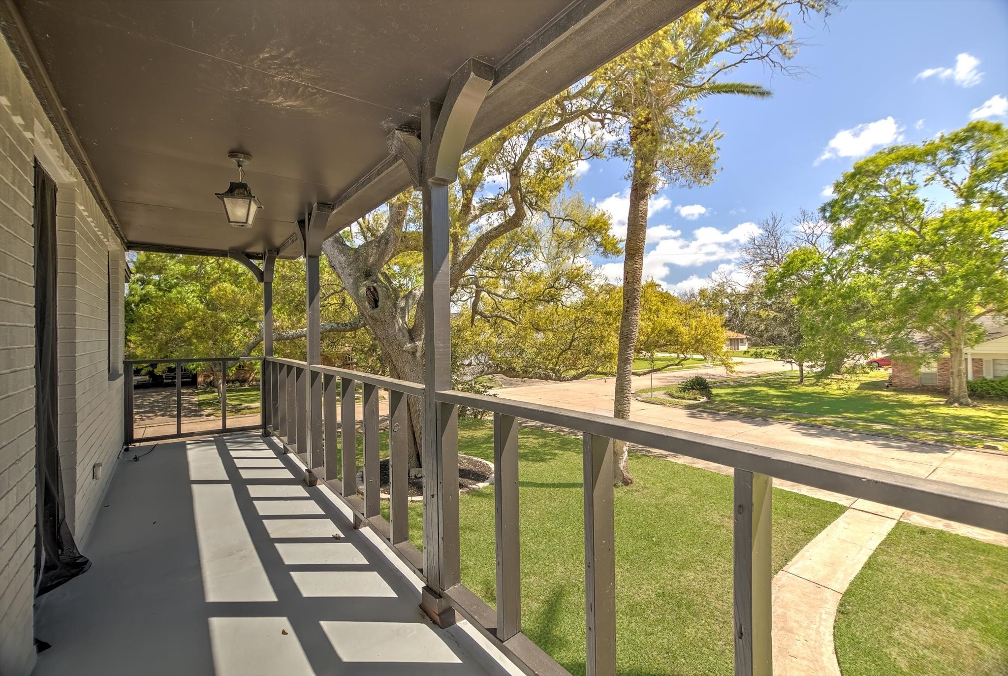 113 Rose Trail Lake Jackson, TX 77566 - Photo 38 of 45 a view of balcony with wooden floor