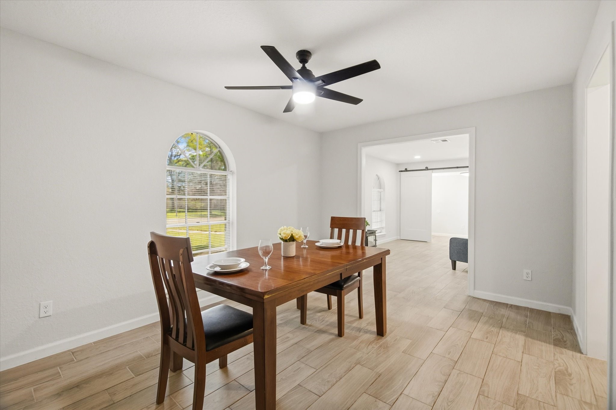 113 Rose Trail Lake Jackson, TX 77566 - Photo 7 of 45 a dining room with furniture and window