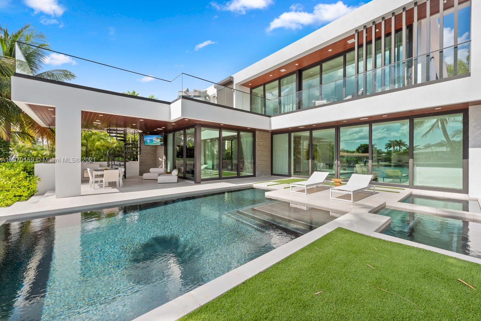 1413 Biscaya Drive Surfside, FL 33154 - Photo 27 of 35 a view of swimming pool with outdoor seating