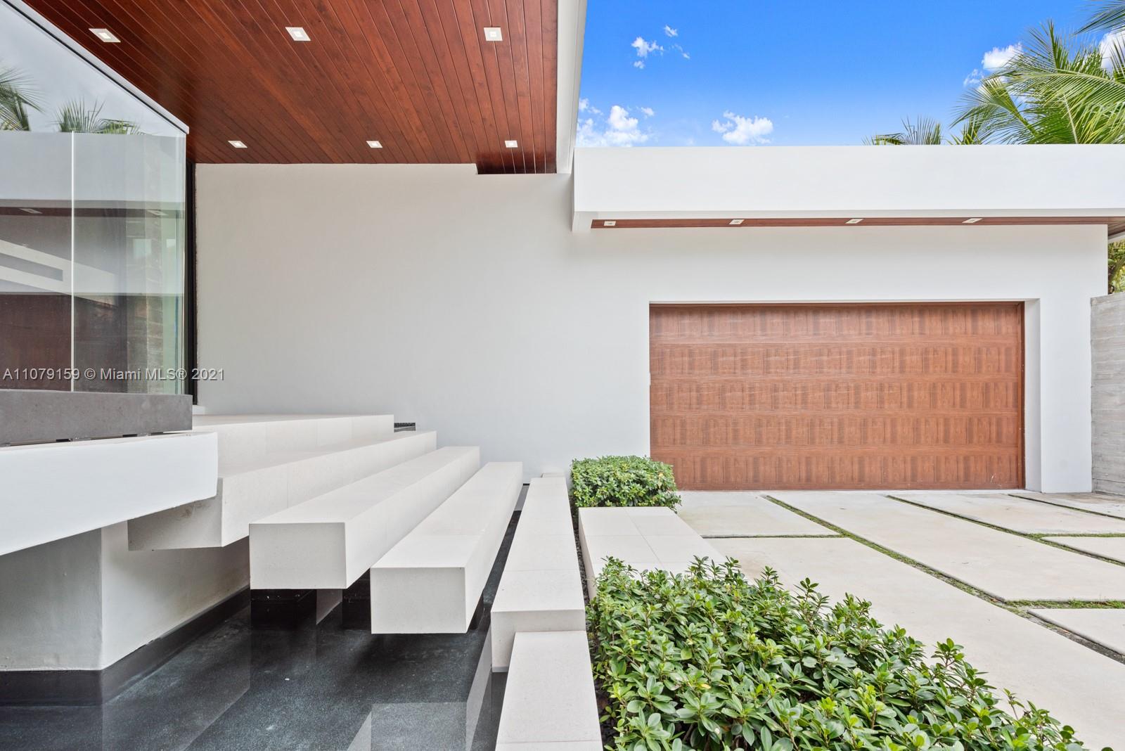 1413 Biscaya Drive Surfside, FL 33154 - Photo 35 of 35 a living room with a bed furniture and a potted plant