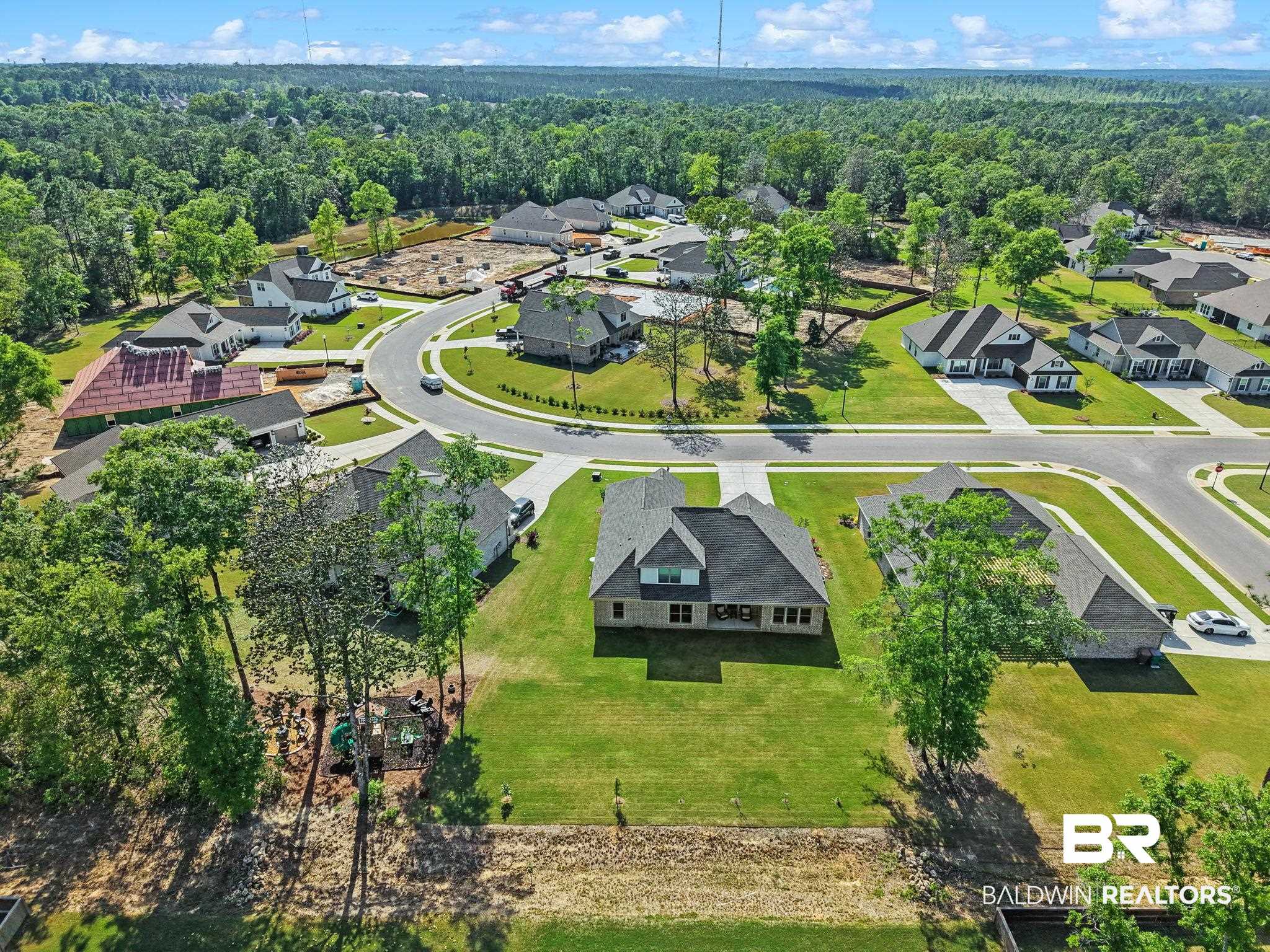 12132 Exbury Way Daphne, AL 36527 - Photo 36 of 47 Aerial perspective of suburban area with a heavily wooded area