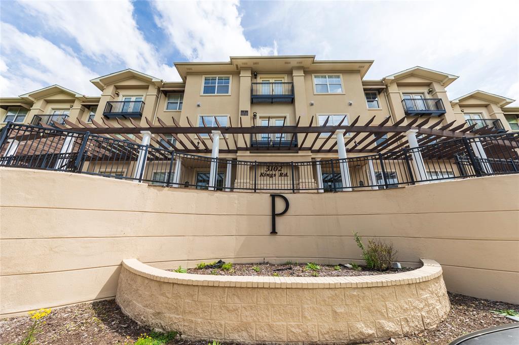 3102 Kings Road, Unit 3310 Dallas, TX 75219 - Photo 3 of 19 a front view of a house