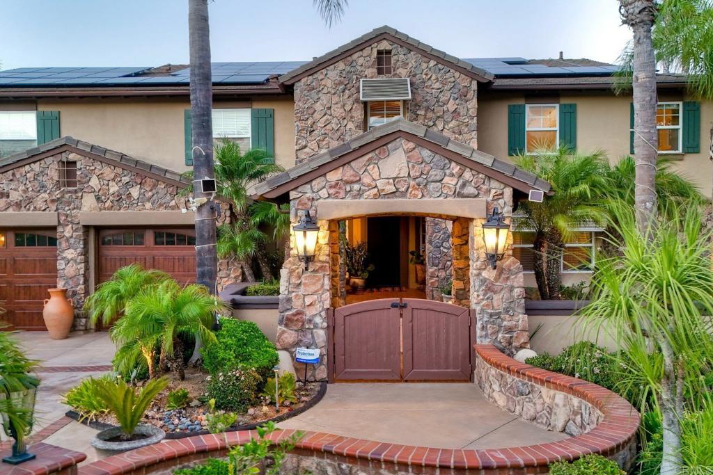 30893 Villa Toscana Road Bonsall, CA 92003 - Photo 31 of 51 Private courtyard with bubbling fountain greet you as you enter the home!