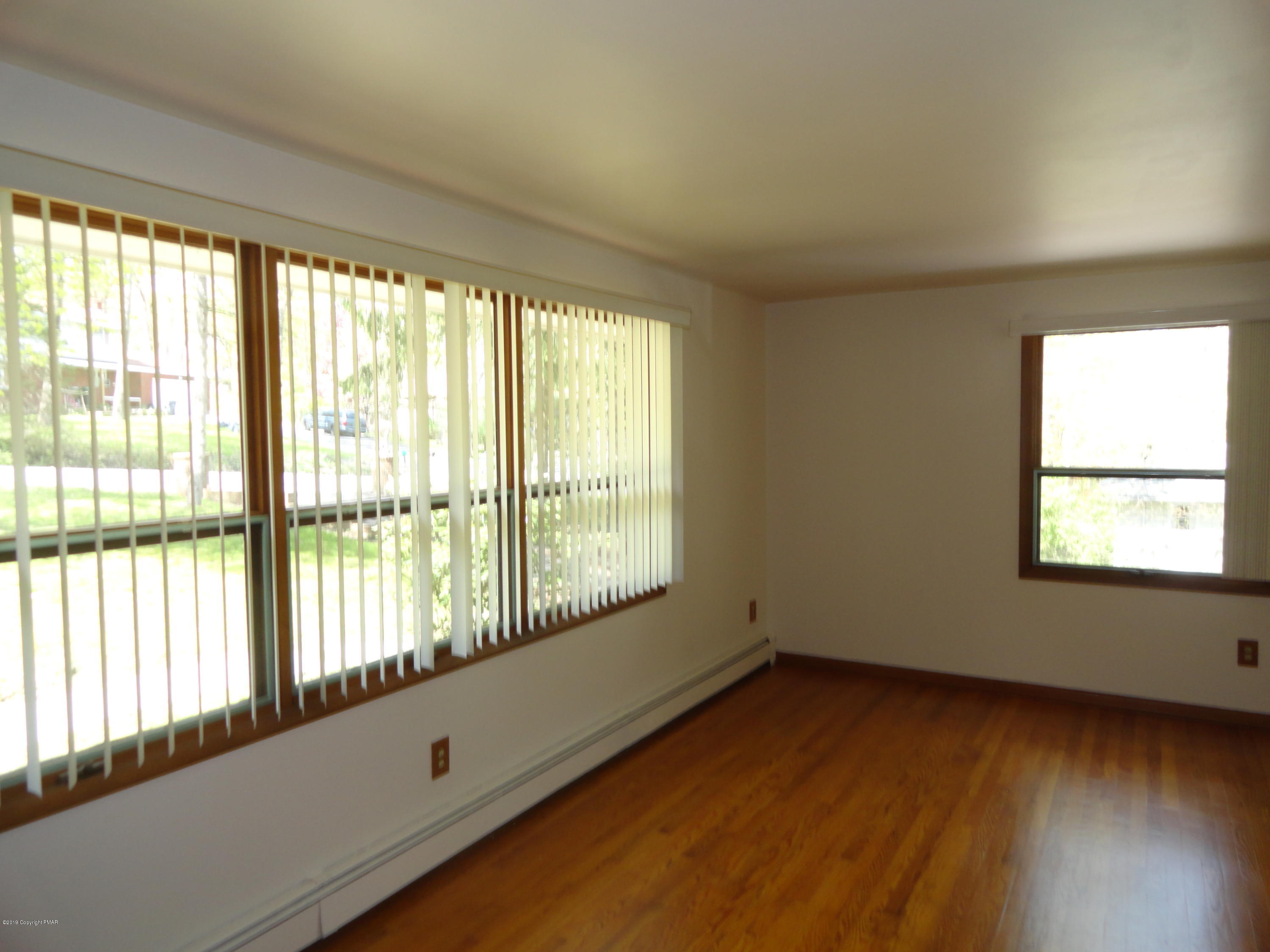 99 Hemlock Road Mount Pocono, PA 18344 - Photo 5 of 28 Living Room 1