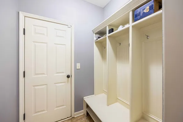 a bathroom with a shower and a sink