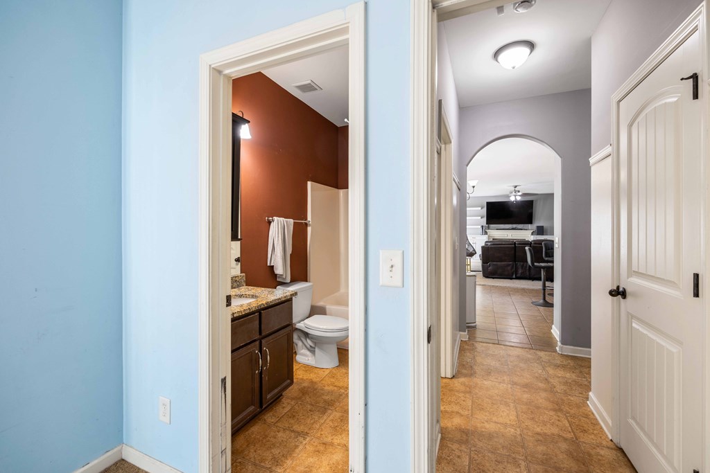 4936 Brightstar Lane Columbus, GA 31907 - Photo 17 of 42 a view of hallway with livingroom and view of bathroom