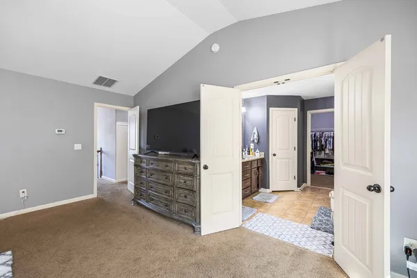 a view of room with furniture and a flat screen tv